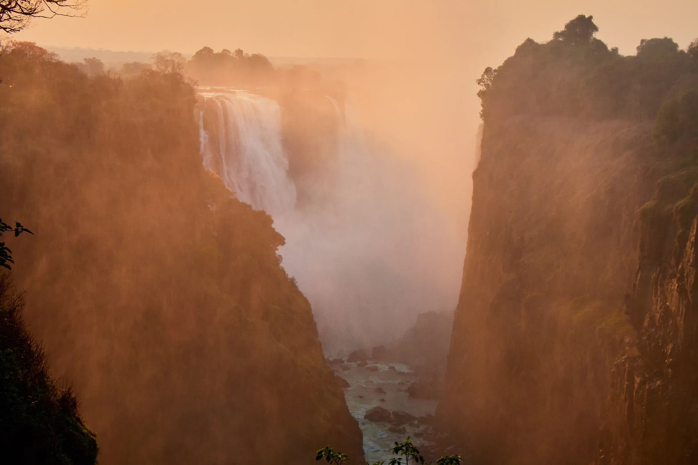 Victoria Falls glowing in golden mist